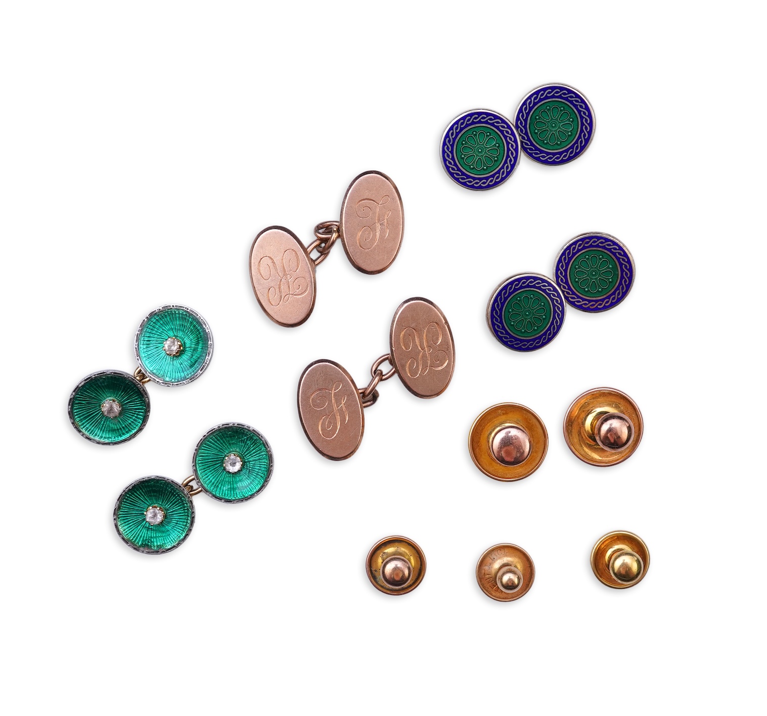 A collection of cufflinks and dress studs